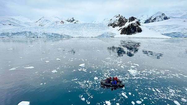 Divergent-Travelers - hero zodiac cruising Cierva Cove Antarctica - Lina Stock