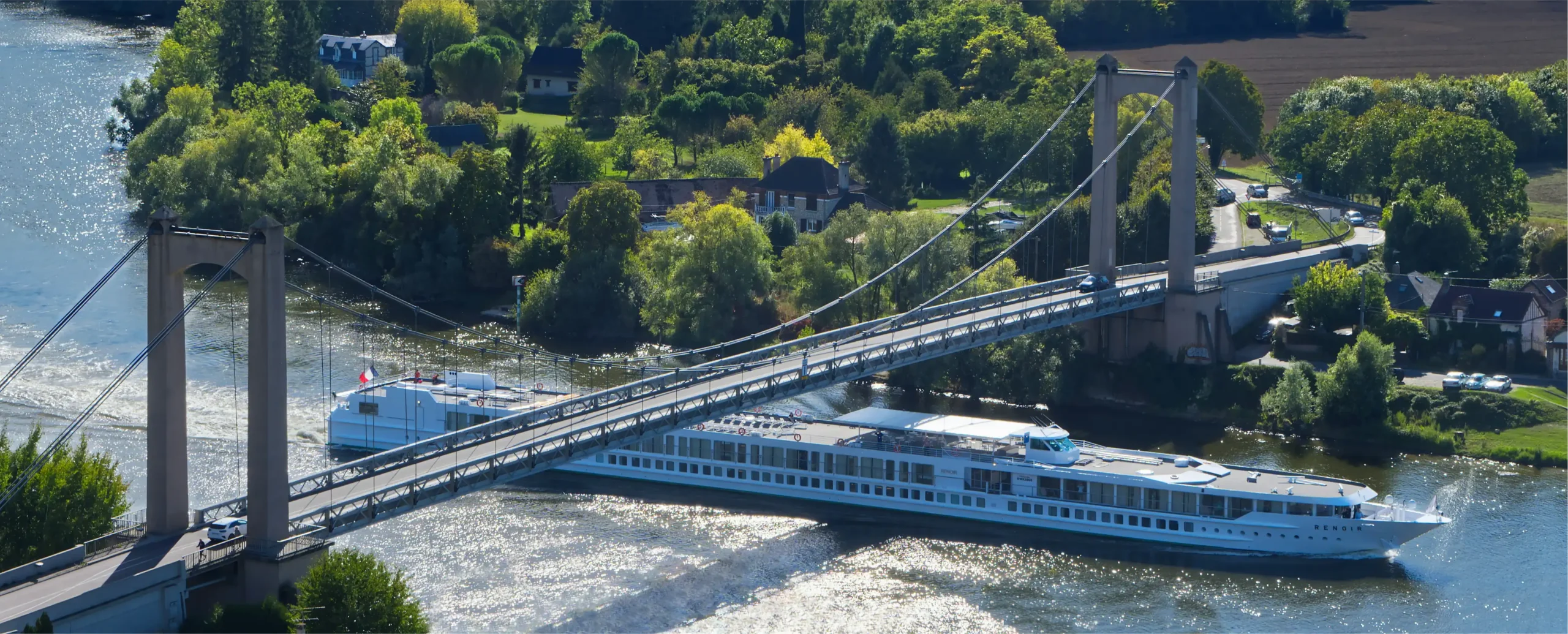 River Cruise Ship Photo by pascal bernardon via Unsplash+.