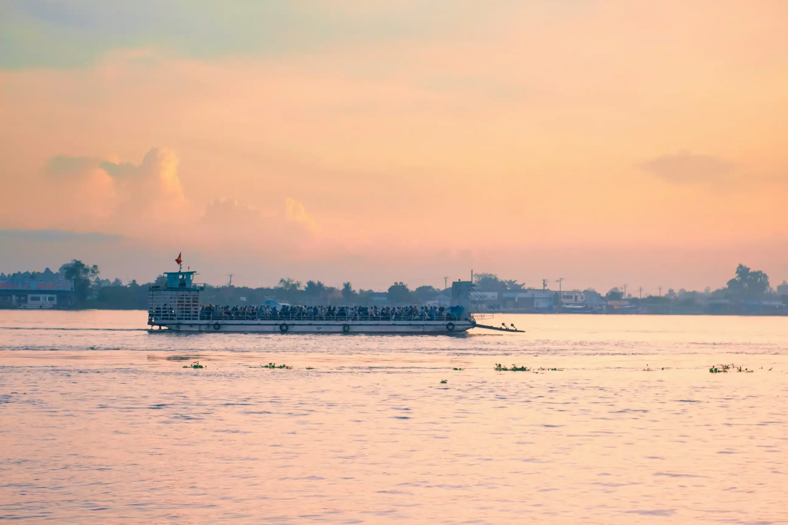 River Cruise Ship Photo by thanh binh via Unsplash+.