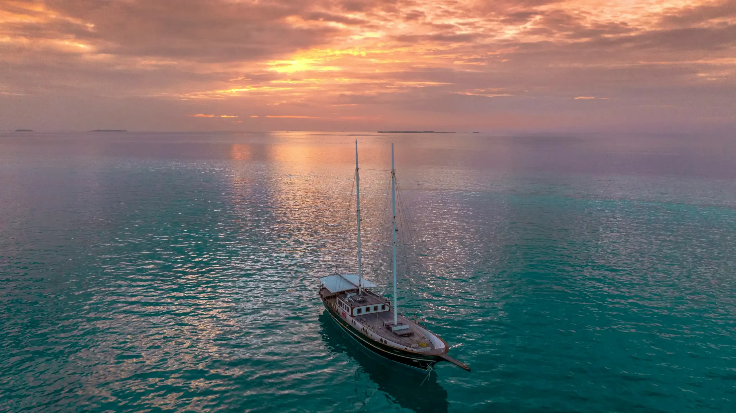 YACHT Photo by tholaal mohamed via Unsplash+.